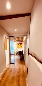 an empty living room with a piano in a room at Atuaire Home El Mirador De La Calle la Puebla PARKING INCLUIDO in Burgos