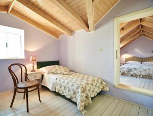 Postel nebo postele na pokoji v ubytování Villa Lemonia