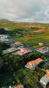 an overhead view of a city with buildings and roads at Apartamento Bela Vista Ilha Terceira in Feteira
