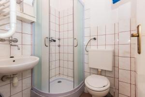 Kúpeľňa v ubytovaní Apartments Krizmanić + 37 fotografií