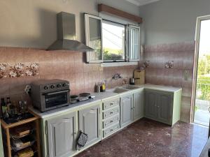 Una cocina o kitchenette en Marble's Residence