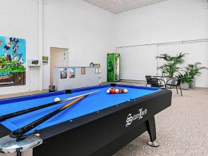 a pool table with balls on it in a room at 6 person holiday home in Brovst in Brovst