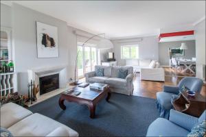 a living room with a couch and a coffee table at Cascais Center Dream House in Cascais