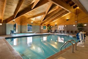 a large swimming pool in a building at Best Western Northwoods Lodge in Siren