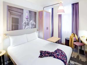 Postel nebo postele na pokoji v ubytování ibis Styles Glasgow Centre George Square