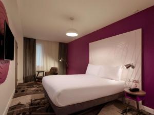 Postel nebo postele na pokoji v ubytování ibis Styles Glasgow Central