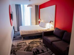 Postel nebo postele na pokoji v ubytování ibis Styles Glasgow Central