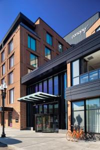 a building with bikes parked in front of it at Canopy By Hilton Boston Downtown in Boston