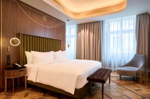 Posteľ alebo postele v izbe v ubytovaní Hotel Saski Krakow Curio Collection by Hilton