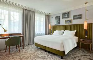Posteľ alebo postele v izbe v ubytovaní Hotel Saski Krakow Curio Collection by Hilton