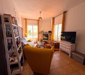 Telewizja i/lub zestaw kina domowego w obiekcie Casa Nuestro Sueño, fantastic sea views
