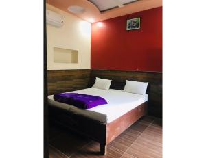 Un ou plusieurs lits dans un hébergement de l'établissement Hotel Pushkar Dream, Pushkar