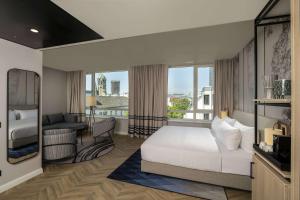 DoubleTree by Hilton Berlin Ku'damm客房内的一张或多张床位