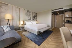 DoubleTree by Hilton Berlin Ku'damm客房内的一张或多张床位