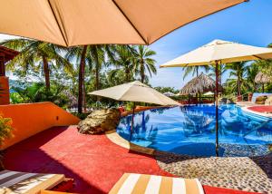 Бассейн в Hilton Grand Vacations Club Zihuatanejo или поблизости