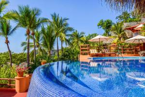 Бассейн в Hilton Grand Vacations Club Zihuatanejo или поблизости