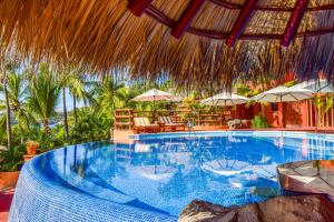 Бассейн в Hilton Grand Vacations Club Zihuatanejo или поблизости