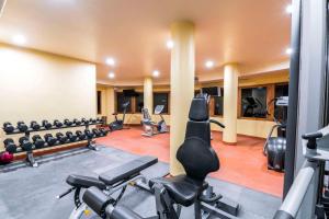 a gym with several treadmills and exercise machines at Hilton Grand Vacations Club Zihuatanejo in Zihuatanejo