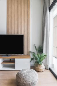 TV a/nebo společenská místnost v ubytování Home2Book Panoramic Views & Stylish Design Agaete