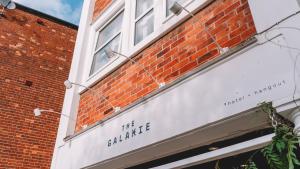 a brick building with the callemite sign on it at The Galaxie in Oxford