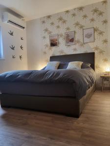 Легло или легла в стая в Chambre climatisée et cosy Auberge du manala Hôtel 24 24