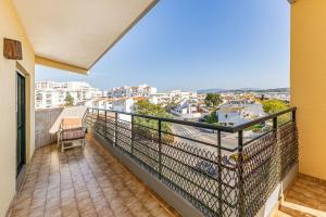 a balcony with a view of a city at Lagos Sea View by Algarve Golden Properties in Lagos