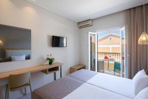 Voodi või voodid majutusasutuse Hotel Rossis toas