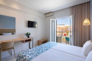 Voodi või voodid majutusasutuse Hotel Rossis toas