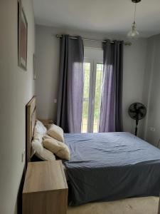 Tempat tidur dalam kamar di Apartamento Vistahermosa