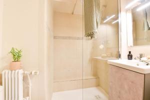 a bathroom with a shower and a sink at Parking - Le Studio - Tramway in Strasbourg