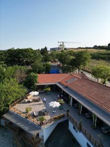 an overhead view of a building with a roof at MAVİ AT HOTEL Blue Horse in Gümüşdere