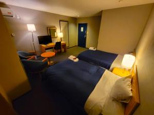 Postel nebo postele na pokoji v ubytování Hotel Seagull