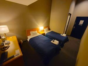 Postel nebo postele na pokoji v ubytování Hotel Seagull