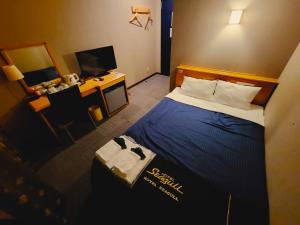 Postel nebo postele na pokoji v ubytování Hotel Seagull