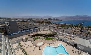 an aerial view of a resort with a pool at premium suite sea side in Eilat