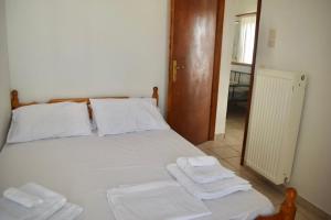 Ένα ή περισσότερα κρεβάτια σε δωμάτιο στο Pantazi House