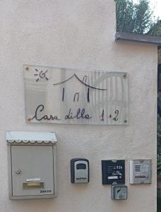 a sign on the side of a building at Casa Lilla 1 e 2 in Oristano