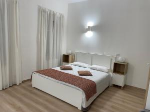 Postel nebo postele na pokoji v ubytování Hotel Casa Valdese Roma