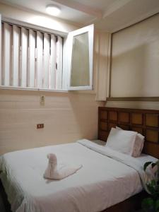 Cama ou camas em um quarto em Hotel Panorama