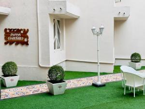 Zahrada ubytování Poppys Pleasant Stay