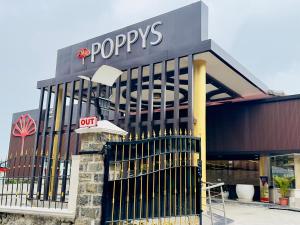 Certifikát, hodnocení, plakát nebo jiný dokument vystavený v ubytování Poppys Pleasant Stay