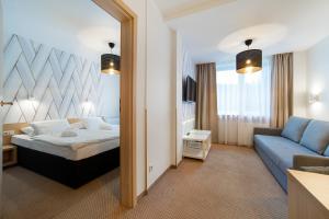 Posteľ alebo postele v izbe v ubytovaní Marena Wellness & Spa