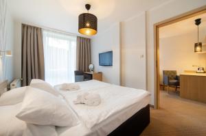 Posteľ alebo postele v izbe v ubytovaní Marena Wellness & Spa