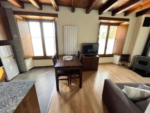 TV a/nebo společenská místnost v ubytování Casa Bernat Apartament