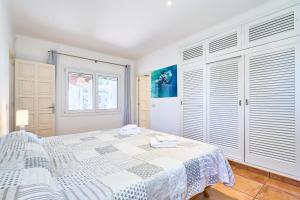 Postel nebo postele na pokoji v ubytování Villa Brusc