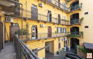 an apartment building in paris with balconies at Nido Milanese - Bocconi, Navigli, Duomo in Milan
