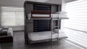 Postel nebo postele na pokoji v ubytování La Bocana de Quiximies Hotel
