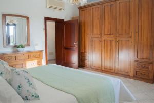 Postel nebo postele na pokoji v ubytování Casa Maddalena