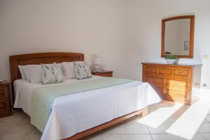 Postel nebo postele na pokoji v ubytování Casa Maddalena