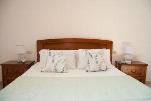 Postel nebo postele na pokoji v ubytování Casa Maddalena
